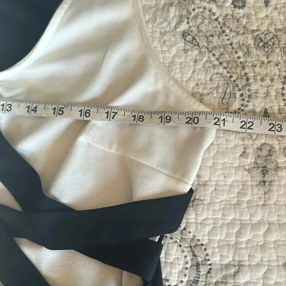 Black and white dress. Below the knee length. Back is solid black w zipper - Picture 3 of 5